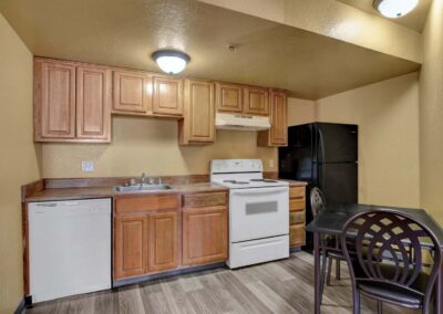 Nellis Suites at Main Gate | An All-Suites Extended Stay Community in Las Vegas, Nevada | Two Bedroom | Kitchen Area